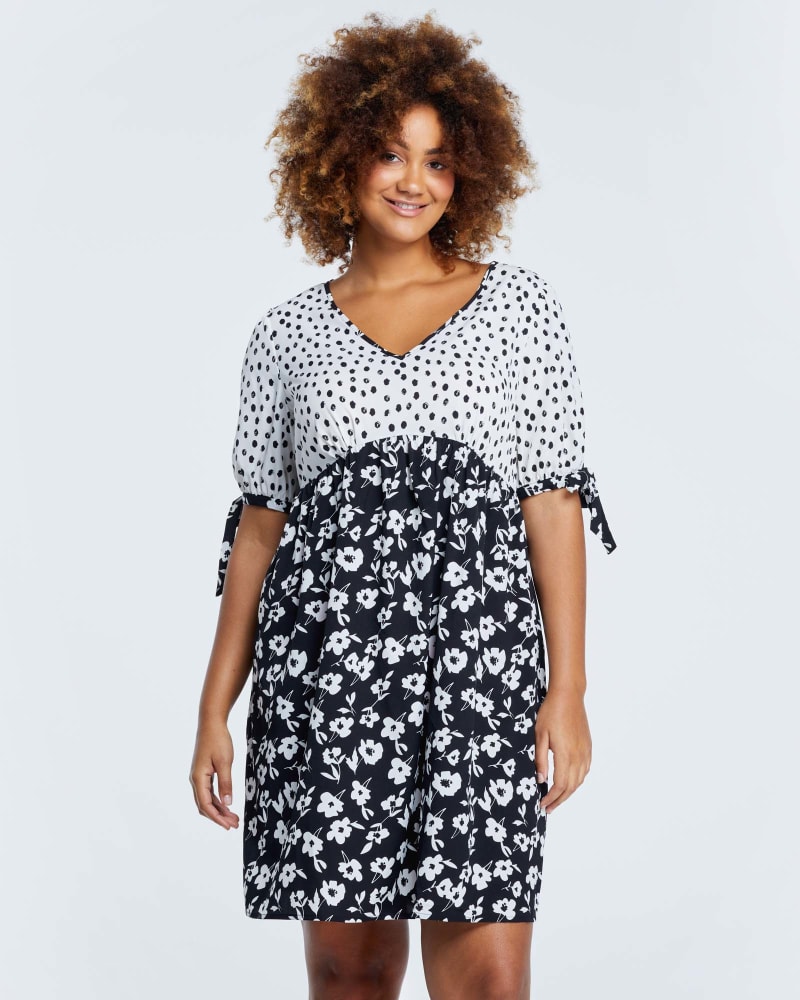 Front of a model wearing a size 4X Canaria Dress in Print by Estelle. | dia_product_style_image_id:264687